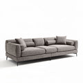 Divano angolare in tessuto grigio con cuscini e dimensioni 200 x 85 x 80cm